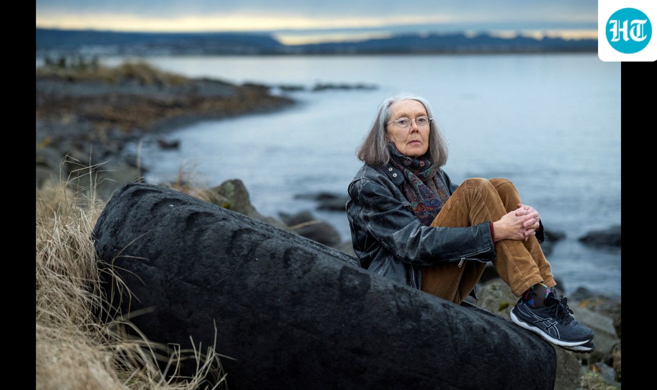Anne Carson, winner of the Nobel Prize for Literature sits outside her home in Reykavik
