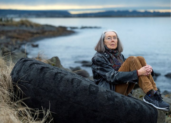 Anne Carson, winner of the Nobel Prize for Literature sits outside her home in Reykavik
